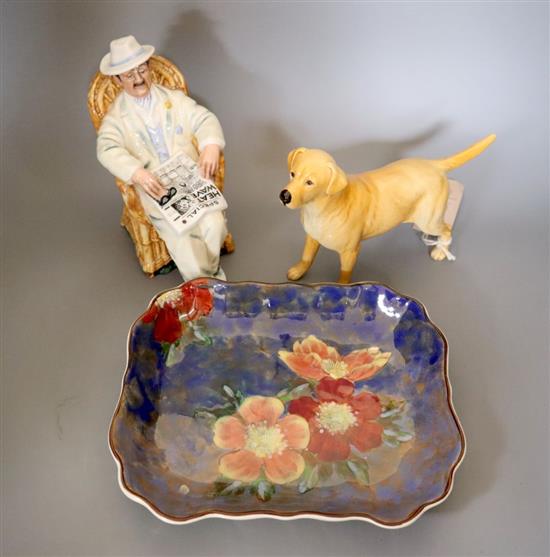 A Beswick porcelain labrador, Doulton figure Taking things easy HN2680 and a Royal Doulton Series ware dish, 23.5cm